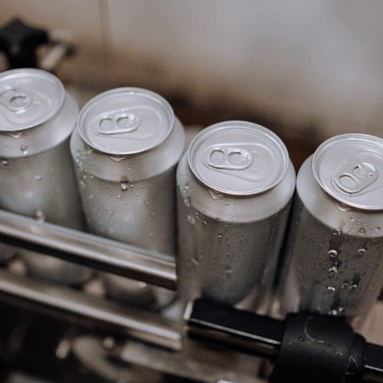 Beverage can manufacturing Photo by cottonbro studio